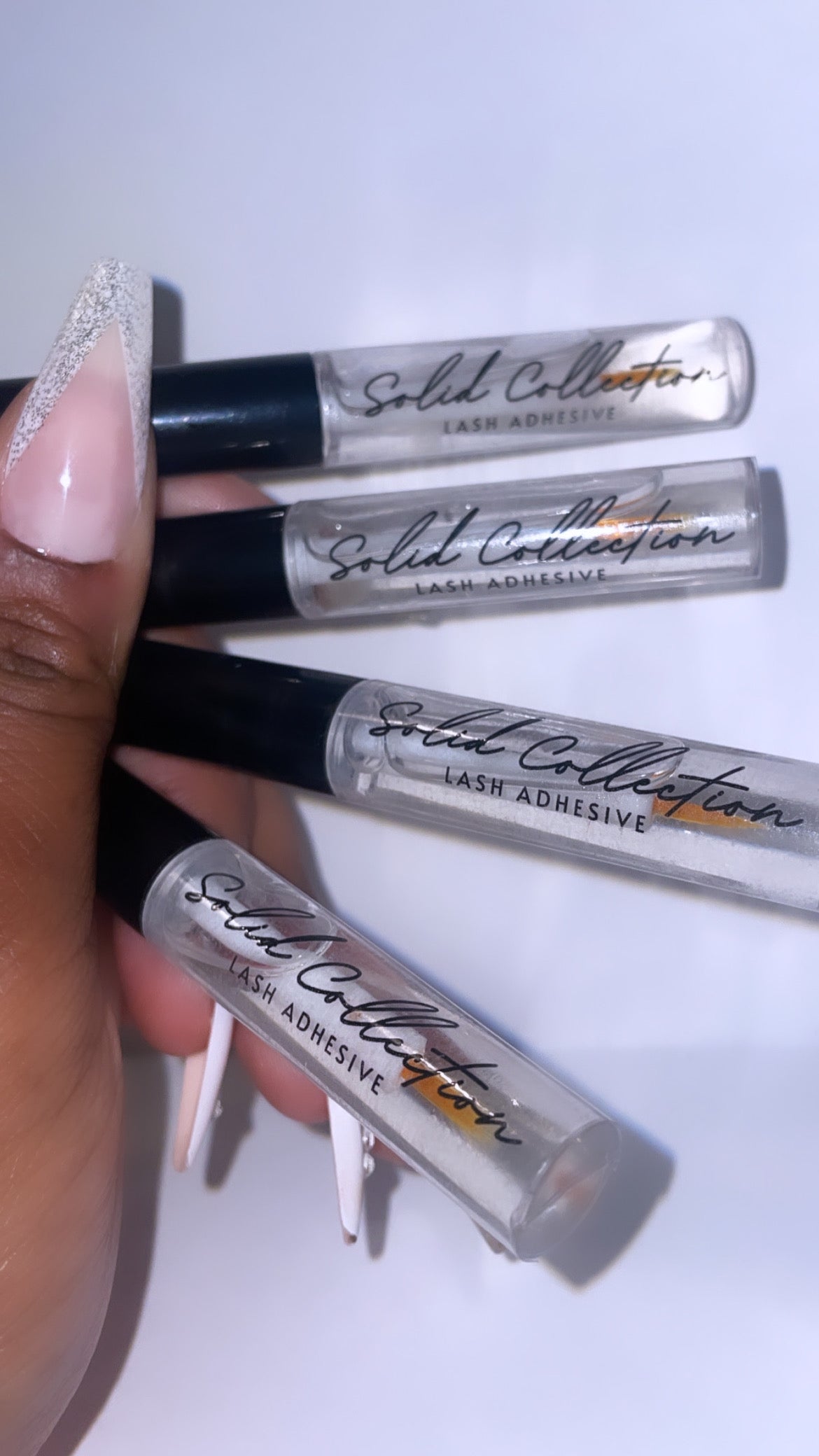 “LASH ADHESIVE”
